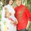Áo dài nam đỏ họa tiết rồng cách điệu